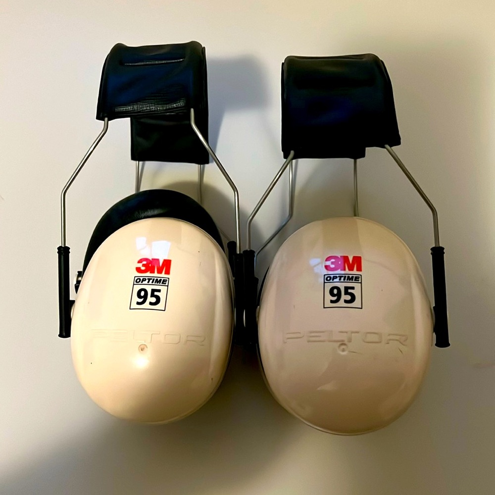 Set of 2 Preowned. 3M Optime 95 Peltor Noise canceling earmuffs / headset